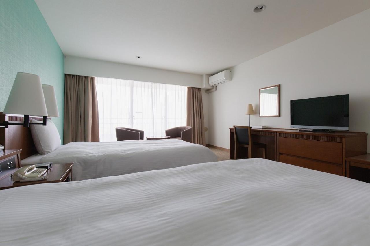 Okinawa Em Wellness Kurashinohakko Lifestyle Resort חדר תמונה
